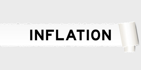 Ripped gray paper background that have word inflation under torn part