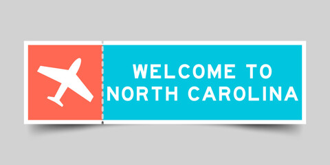 Orange and blue color ticket with plane icon and word welcome to north corolina on gray background