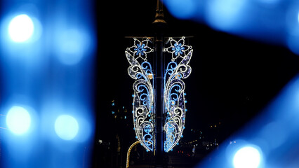 Lantern in the city at night, closeup of photo