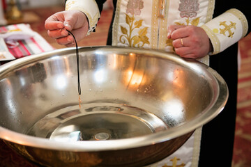 Christening in church sacrament of baptism