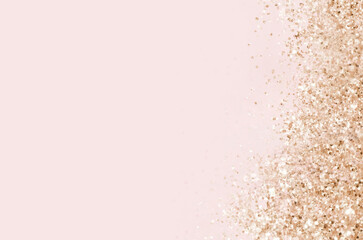 Gold sparkles on pink background. Light pink minimalistic festive glamorous background with...