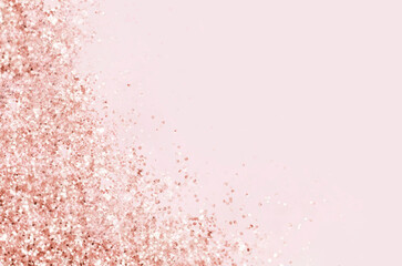 Golden pink sparkles on pink background. Light pink minimalistic festive glamorous background with...