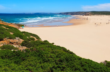 wild Praia da Bordeira beach at the west Algarve coast of Portugal
