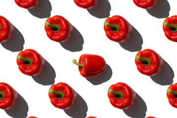 Red fresh paprika pepper on a white background. Top view, flat lay