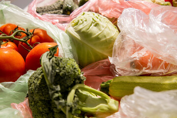 Fresh vegetables in plastic bags. Top view, flat lay