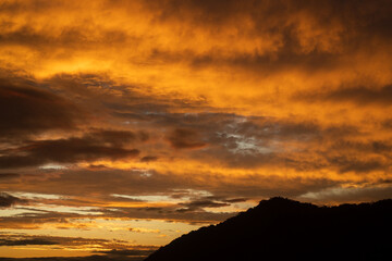 Clouds and mountains at sunset 