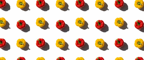 Fresh paprika pepper on a white background. Top view, flat lay. Banner