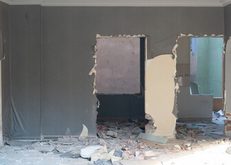 Ruined house during the process of urban transformation. Demolition of old buildings. Building demolition in urban transformations