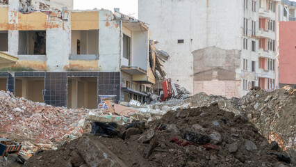 Ruined house during the process of urban transformation. Demolition of old buildings. Building...