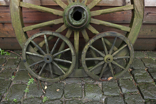 Close-up of old wooden wagon wheels
