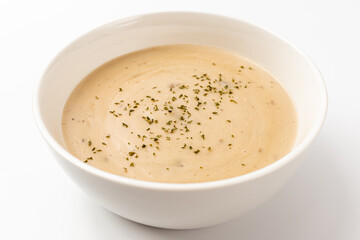 Mushroom cream soup on a white background