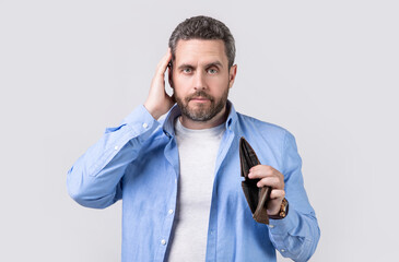 amazed poor man with wallet isolated on studio background. poor man with wallet
