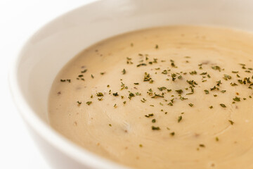 Mushroom cream soup on a white background