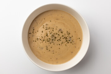 Mushroom cream soup on a white background