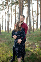 Young couple tenderly embracing each other on a sunny day