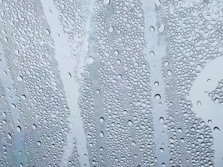 Raindrops on glass blur background rainy season concept, weather forecast meteorological department weather bad visibility cold weather sleep to sleep...