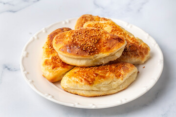 Turkish cuisine; Handmade Cheese spinach Pastry (Turkish name; peynirli - ispanakli pogaca)