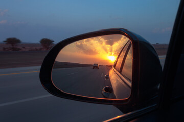 driving in the sunset
