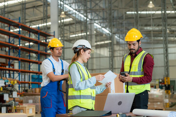 Group of warehouse workers having a meeting