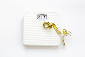 Check your body shape with weight scales and tape measure