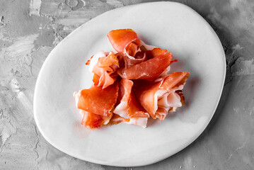 Prosciutto crudo, Italian salami, parma ham. Antipasto plate