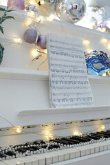 ornately decorated piano keys in light lighting