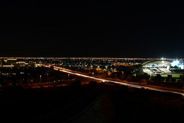 DJ in suit playing music in a party at night in Dubai, Downtown, burj khalifa