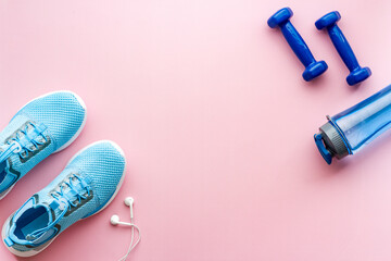 Fitness flatlay with workout sport tools, top view