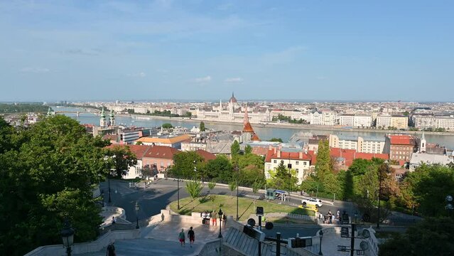 Budapest, Hungary, August 2022. POV footage walking towards the arched balcony of the fishermen's bastion, we look out and look at the urban landscape. Magnificent view and beautiful summer day.