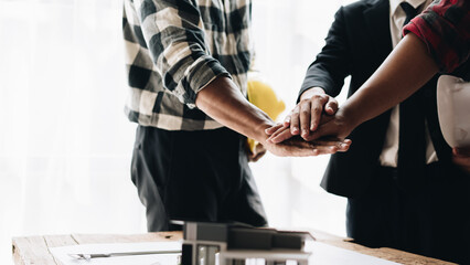 Fototapeta premium Group of industries workers woking together. Engineer and teamwork.