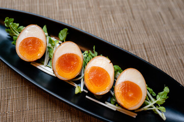 Japanese Food Style : Top view homemade Egg yolks marinated in Japanese sauce and sprinkled with...