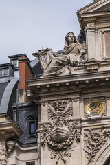Obraz premium Architectural fragments of the BNP Paribas building on 14 rue Bergere (1881). Paris. France.