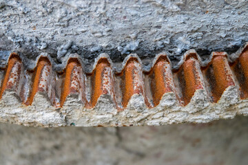 Rusty concrete mixer gear up close for industrial, construction, and architectural design projects....