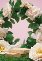 wood podium beige rose flowers on pink pastel background with space.beauty cosmetic skin care advertising stage,luxury romantic love valentines or mother gift, product pedestal platform stand display.