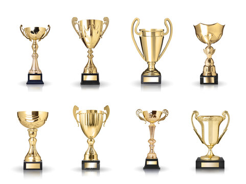 Set of golden trophies isolated