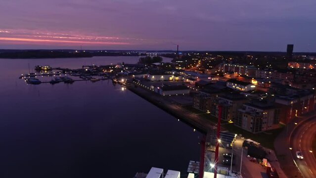 Aerial Over Vastervik At Sunset. Archipelago City In Kalmar County, Sweden. pullback