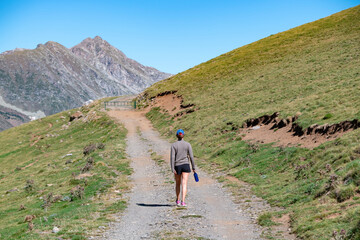 girl from behind hiker in the pyrenees