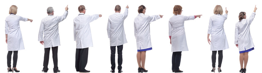 group of doctors standing with their backs isolated