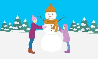Mother and daughter building snowman