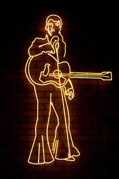Los Angeles - September 28 2013: Close-up on a yellow neon light shaped into Elvis Presley singing in Las Vegas.