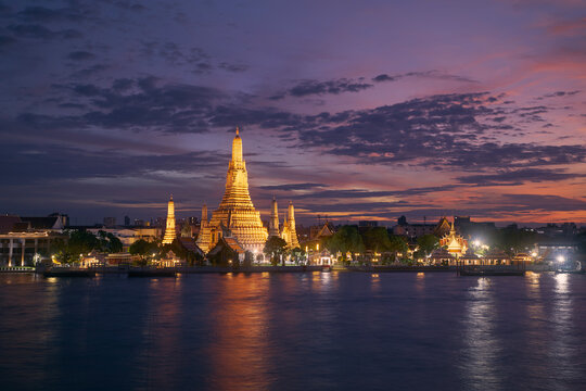Bangkok cityscape with Chao Phraya River and Wat Arun at beautiful twilight, Thailand..