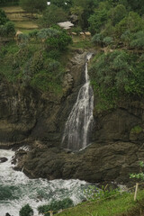 Fototapeta na wymiar waterfall in the sea