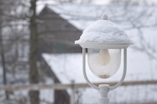 Little white snow-covered lantern