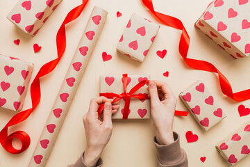 Creative gift box with decorations for the holiday, top view. Birthday and valentine present