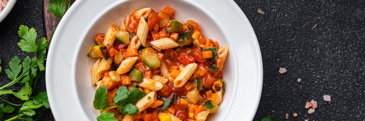 pasta salad tomato, cucumber, corn, vegetables healthy meal food snack on the table copy space food background rustic top view veggie vegan or vegetarian food no meat