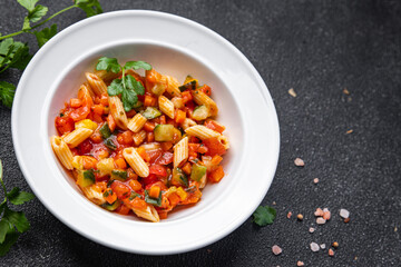 pasta salad tomato, cucumber, corn, vegetables healthy meal food snack on the table copy space food background rustic top view veggie vegan or vegetarian food no meat