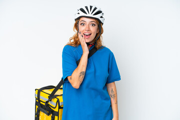 Young caucasian woman with thermal backpack isolated on white background with surprise and shocked facial expression