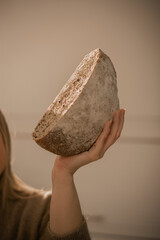 person holding a bread