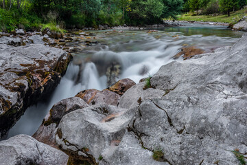 Light blue water in Soca river in summer hot evening in Slovenia