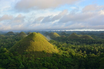 Obraz premium clouds over the hills